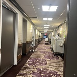 The Grand Pavilion for Rehabilitation & Nursing - An empty hallway no nurses. Blinking help light in rear