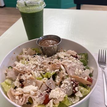 Odd Birds - Greek salad with roasted turkey and a green smooths. - Bakeries Near Me - Hilton Head Island, South Carolina