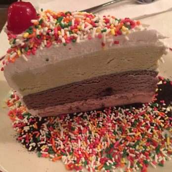 Parm - Neapolitan ice cream cake--we made a dent in this too. - Italian Near Me - New York, New York Parm - Neapolitan ice cream cake--we made a dent in this too. - Italian Near Me - New York, New York