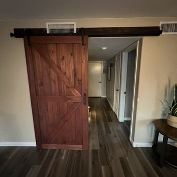 Rock Edge Construction - Barn door slider dividing door - General Contractors Near Me
