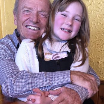 Hotel St. Bernard - Dadou Mayer with his grand daughter. - Hotels Near Me - Taos, New Mexico Hotel St. Bernard - Dadou Mayer with his grand daughter. - Hotels Near Me - Taos, New Mexico