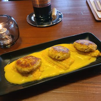 The Courthouse Club - Crab Cake Minis served over sweet corn emulsion. - American Near Me - Noblesville, Indiana The Courthouse Club - Crab Cake Minis served over sweet corn emulsion. - American Near Me - Noblesville, Indiana