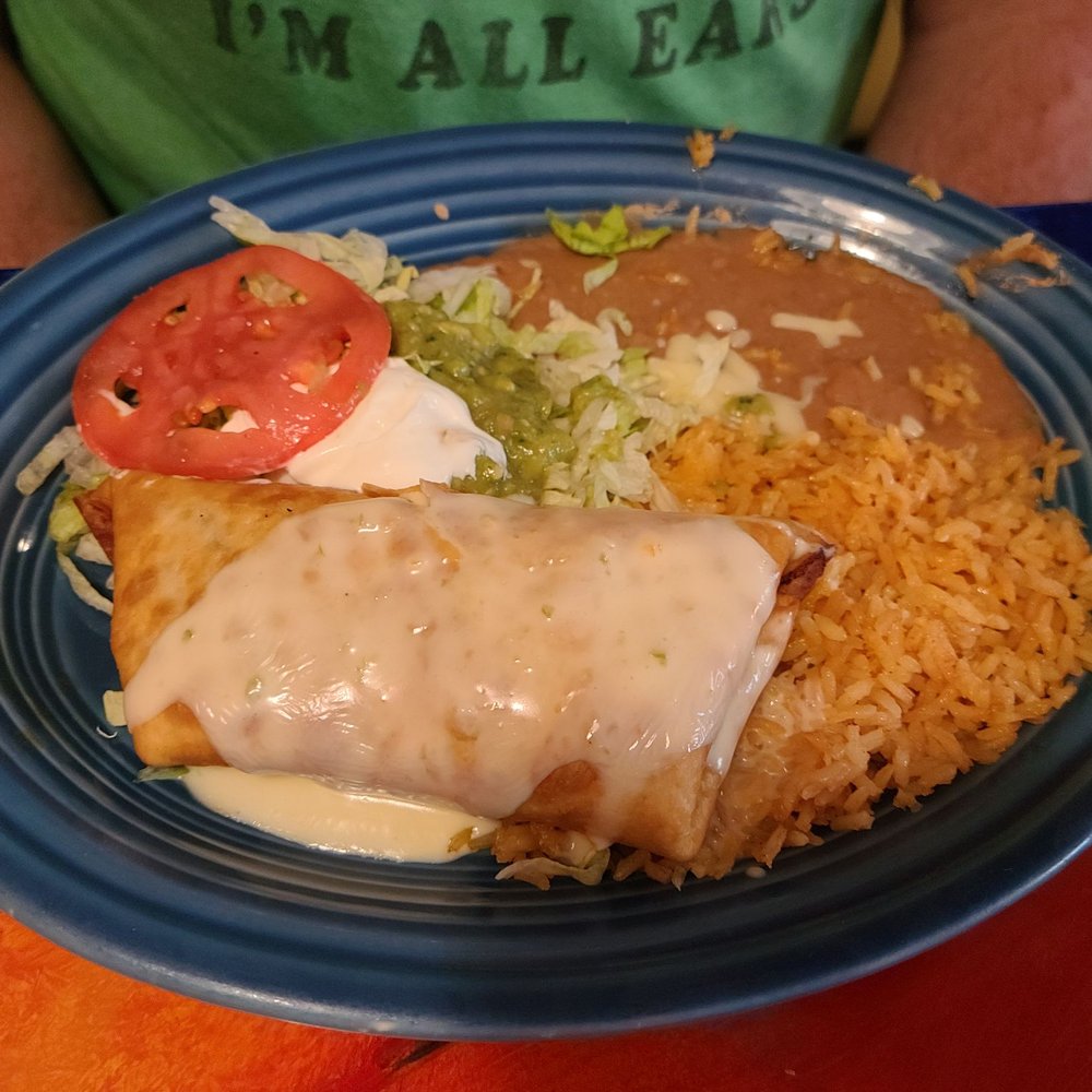 Chimichanga, rice, beans and salad Chimichanga, rice, beans and salad