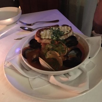 The Terrace - Wahoo Bouillabaise mussels, littleneck clams, shrimp, tomato-fennel broth, red pepper-saffron rouille, grilled rustic bread - French Near Me - Cruz Bay, Virgin Islands The Terrace - Wahoo Bouillabaise mussels, littleneck clams, shrimp, tomato-fennel broth, red pepper-saffron rouille, grilled rustic bread - French Near Me - Cruz Bay, Virgin Islands