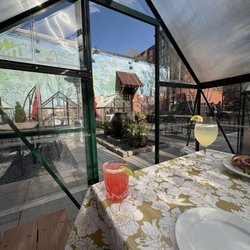 Dining in the green house. Strawberry margarita and bulldawg spritz