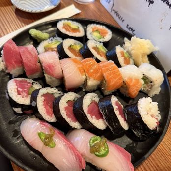 Izakaya Full Moon - From the back moving forward: salmon cut roll, rainbow roll, bluefin tuna roll, Serrano pepper kanpachi - Izakaya Near Me - Ojai, California Izakaya Full Moon - From the back moving forward: salmon cut roll, rainbow roll, bluefin tuna roll, Serrano pepper kanpachi - Izakaya Near Me - Ojai, California