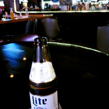 Crying Shame - a bottle of beer on a table - Bars Near Me - Waco, Texas Crying Shame - a bottle of beer on a table - Bars Near Me - Waco, Texas