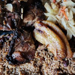 The Hummingbird Restaurant - Jerk Chicken, Peas and Rice and Cabbage. I threw a couple of plantains in.