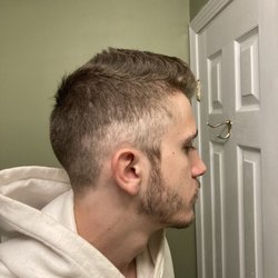 Chris' Barbershop - Men's Haircut and Shave.