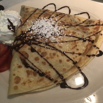 Le Petit Triangle Cafe - Peanut Butter Crepe with dark chocolate. - French Near Me - Cleveland, Ohio Le Petit Triangle Cafe - Peanut Butter Crepe with dark chocolate. - French Near Me - Cleveland, Ohio