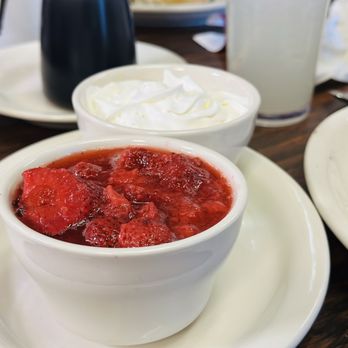 Russell's Restaurant - a bowl of strawberries and whipped cream - American Near Me - Salina, Kansas Russell's Restaurant - a bowl of strawberries and whipped cream - American Near Me - Salina, Kansas
