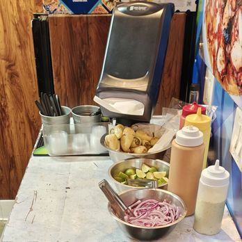 Roger's Baja Seafood Experience - Condiments and sauces station - Seafood Near Me - National City, California Roger's Baja Seafood Experience - Condiments and sauces station - Seafood Near Me - National City, California