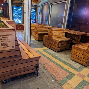 Gray Area - a row of wooden benches on a sidewalk - Community Service/Non-Profit Near Me - San Francisco, California Gray Area - a row of wooden benches on a sidewalk - Community Service/Non-Profit Near Me - San Francisco, California
