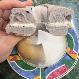 Blueberry bagel with cream cheese. Blueberry bagel with cream cheese.
