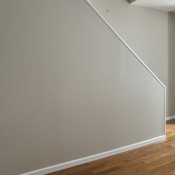 Larry The Painter - Entrance wall... well caulked molding - Painters Near Me
