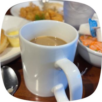 Early Birds Cafe - Coffee and beautiful tots in the background - Breakfast & Brunch Near Me - Fresno, California
