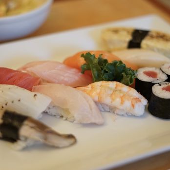 Faceless Samurai - a variety of sushi on a plate - Japanese Near Me - Palm Harbor, Florida Faceless Samurai - a variety of sushi on a plate - Japanese Near Me - Palm Harbor, Florida