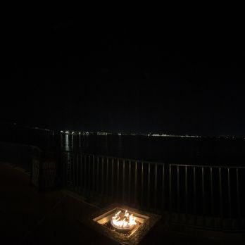 Gordon Ramsay Steak - Sit by the fire overlooking the Calcasieu River and old I-10 bridge. - Steakhouses Near Me - Westlake, Louisiana