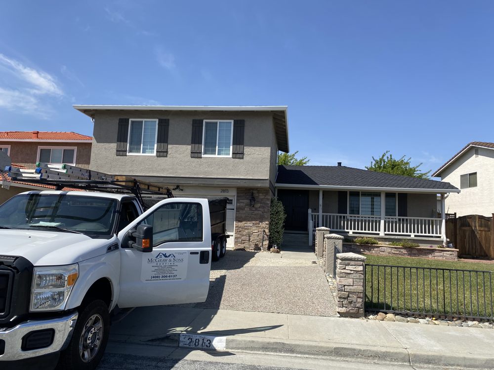 Slide of McGraw and Sons Roofing