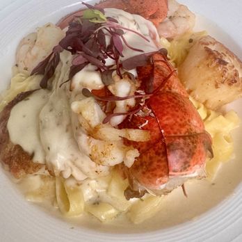 Vic's On the River - The Atlantic Shellfish Melange, a signature dish. - Seafood Near Me - Savannah, Georgia