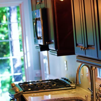Stafford Construction - a kitchen with a sink, stove, and refrigerator - General Contractors Near Me Stafford Construction - a kitchen with a sink, stove, and refrigerator - General Contractors Near Me
