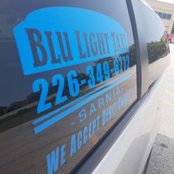 Blu Light Taxi - Blu light logo