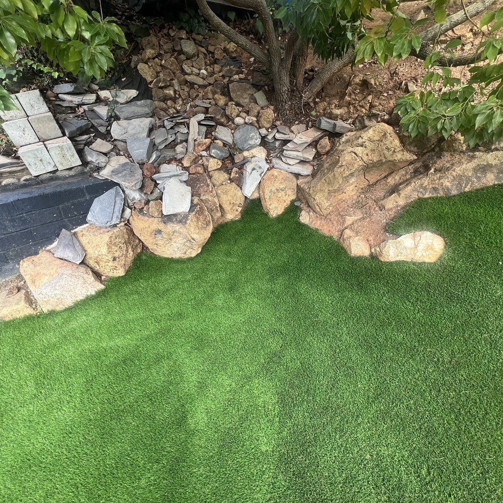 Detail work around existing boulders