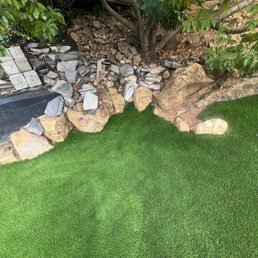 Detail work around existing boulders