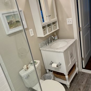 LMR Services - a bathroom with a toilet and sink - General Contractors Near Me LMR Services - a bathroom with a toilet and sink - General Contractors Near Me
