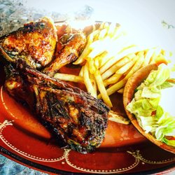King of the Pigs - Rei dos Leitões - Beef rib and 1/4 chicken combo with fries and salad.
