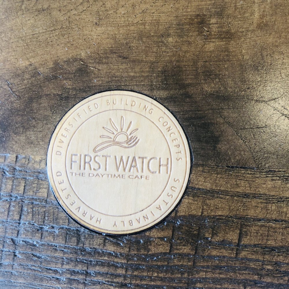 First Watch - All the tables have this wood chip engraved. Nice detail. - Breakfast & Brunch Near Me - Humble, Texas First Watch - All the tables have this wood chip engraved. Nice detail. - Breakfast & Brunch Near Me - Humble, Texas