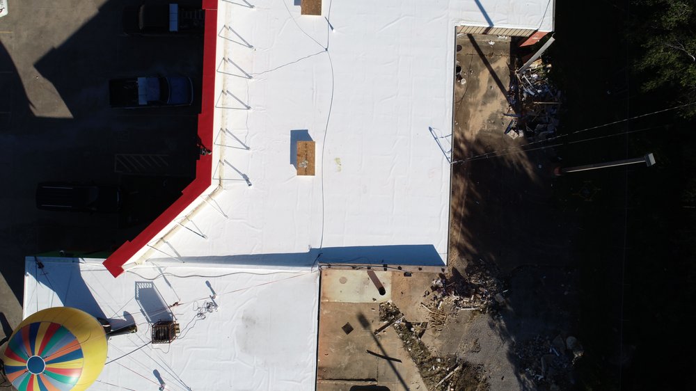 Slide of Qualitas Roofing and Construction