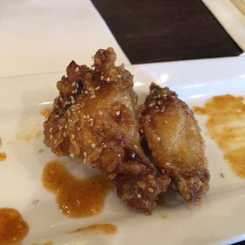 DOMU - The wings- perfect crunch and a sweet spicy flavor! I could have eaten all of these if my husband and son didn't steal them so fast! - Ramen Near Me - Orlando, Florida