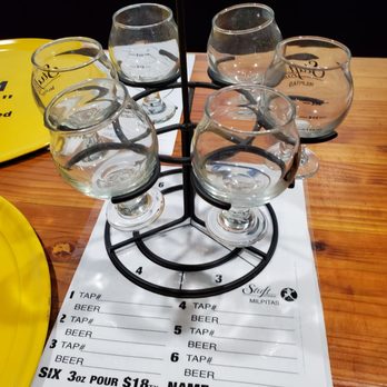 Stuft Pizza - Empty beer flight with empty flight card - Pizza Near Me - Milpitas, California Stuft Pizza - Empty beer flight with empty flight card - Pizza Near Me - Milpitas, California