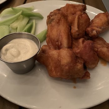 Red's Table - Maple-sriracha chicken wings - New American Near Me - Reston, Virginia Red's Table - Maple-sriracha chicken wings - New American Near Me - Reston, Virginia