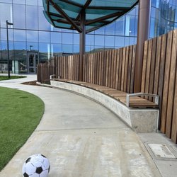 Library | Parks and Recreation Center - Sitting area surround the play area