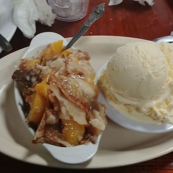 Stephanie's Restaurant - I topped off my meal with this wonderful peach cobbler and vanilla ice cream. DELICIOUS - American Near Me - Greensboro, North Carolina Stephanie's Restaurant - I topped off my meal with this wonderful peach cobbler and vanilla ice cream. DELICIOUS - American Near Me - Greensboro, North Carolina