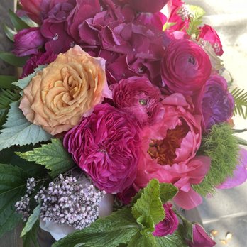 CITY FLOWERS - Our reception tables were adorned with these lovely arrangements! They brightened up the entire room. - Florists Near Me - Bellevue, Washington