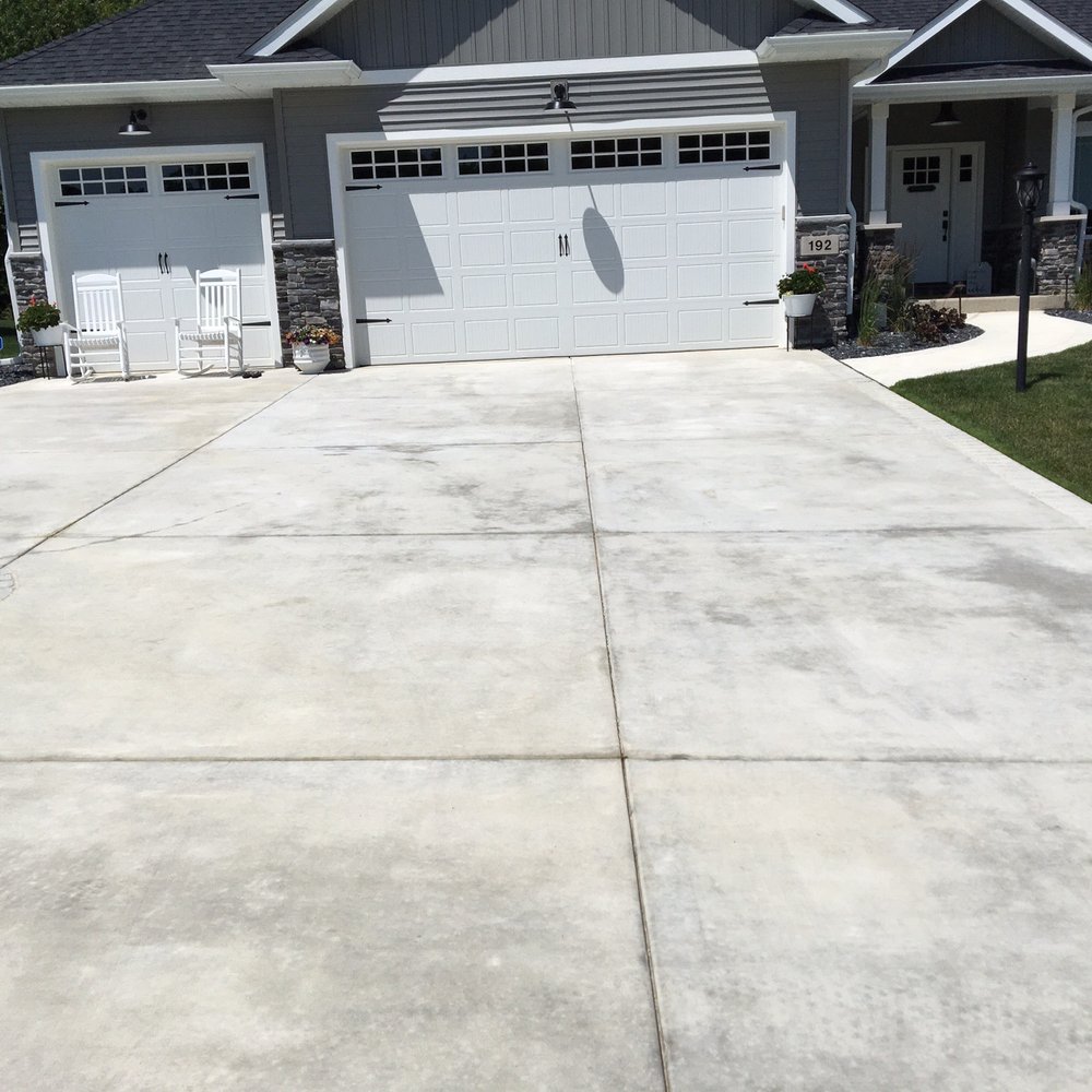 Florence Concrete Construction - a concrete driveway in front of a house - Masonry/Concrete Near Me - Crown Point, Indiana Florence Concrete Construction - a concrete driveway in front of a house - Masonry/Concrete Near Me - Crown Point, Indiana