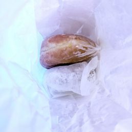 Glazed and powdered donuts Glazed and powdered donuts