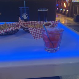 a table with drinks and snacks