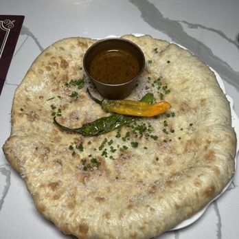 Monarch & Lion - Chili Cheese Naan - British Near Me - Chicago, Illinois Monarch & Lion - Chili Cheese Naan - British Near Me - Chicago, Illinois
