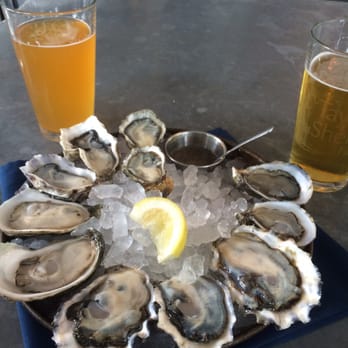 Taylor Shellfish Oyster Bar - Shuckers dozen and local beers on tap - Seafood Near Me - Seattle, Washington Taylor Shellfish Oyster Bar - Shuckers dozen and local beers on tap - Seafood Near Me - Seattle, Washington