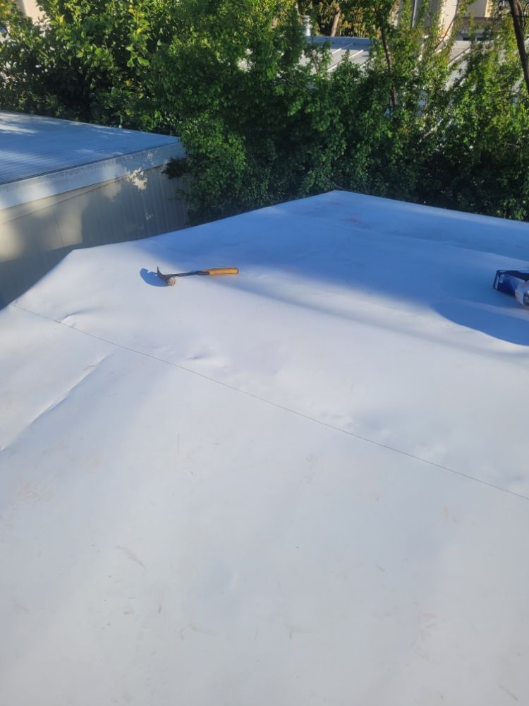 Slide of Roofing & Garden