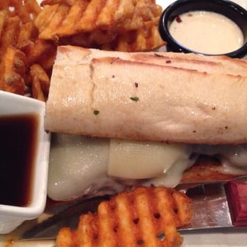 Hobo's Cafe - N.Y. Sirloin Steak sandwich - served on garlic bread with melted Swiss. so tender. - New American Near Me - Key Largo, Florida Hobo's Cafe - N.Y. Sirloin Steak sandwich - served on garlic bread with melted Swiss. so tender. - New American Near Me - Key Largo, Florida