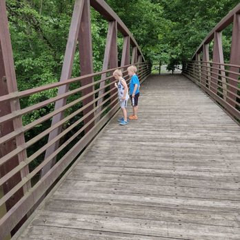 Billy Dunlop Park - My favorite models (aka my grands) watching for the sticks they threw in on the other side to float by. - Hiking Near Me - Clarksville, Tennessee Billy Dunlop Park - My favorite models (aka my grands) watching for the sticks they threw in on the other side to float by. - Hiking Near Me - Clarksville, Tennessee