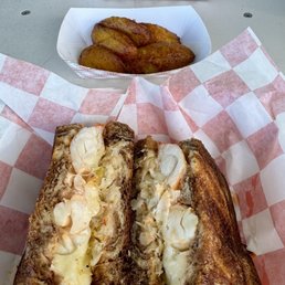 Lobster Reuben, plantains and coconut shrimp