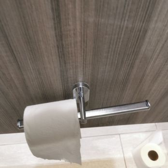 Hilton Columbus at Easton - Toilet paper holder with no barriers to prevent toilet paper from sliding off. You have to hold it to rip off the toilet paper EW - Hotels Near Me - Columbus, Ohio Hilton Columbus at Easton - Toilet paper holder with no barriers to prevent toilet paper from sliding off. You have to hold it to rip off the toilet paper EW - Hotels Near Me - Columbus, Ohio
