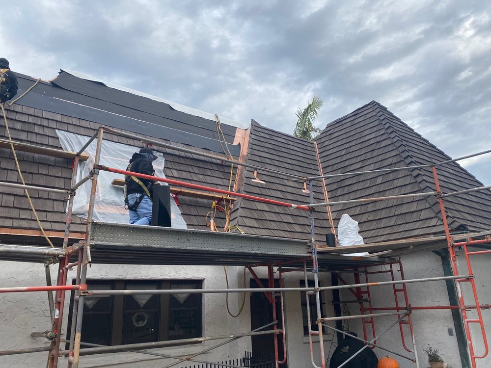 Slide of Diamond Roofing