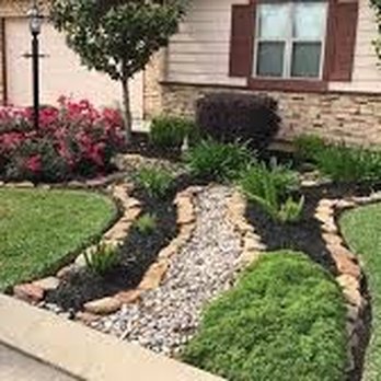 Sunshine Quality Cuts - the front yard of a home - Lawn Services Near Me Sunshine Quality Cuts - the front yard of a home - Lawn Services Near Me